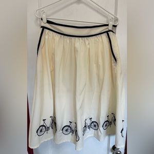 Knee length skirt with bicycle design
